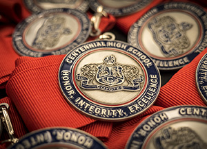 Pile of Centennial graduation medallions